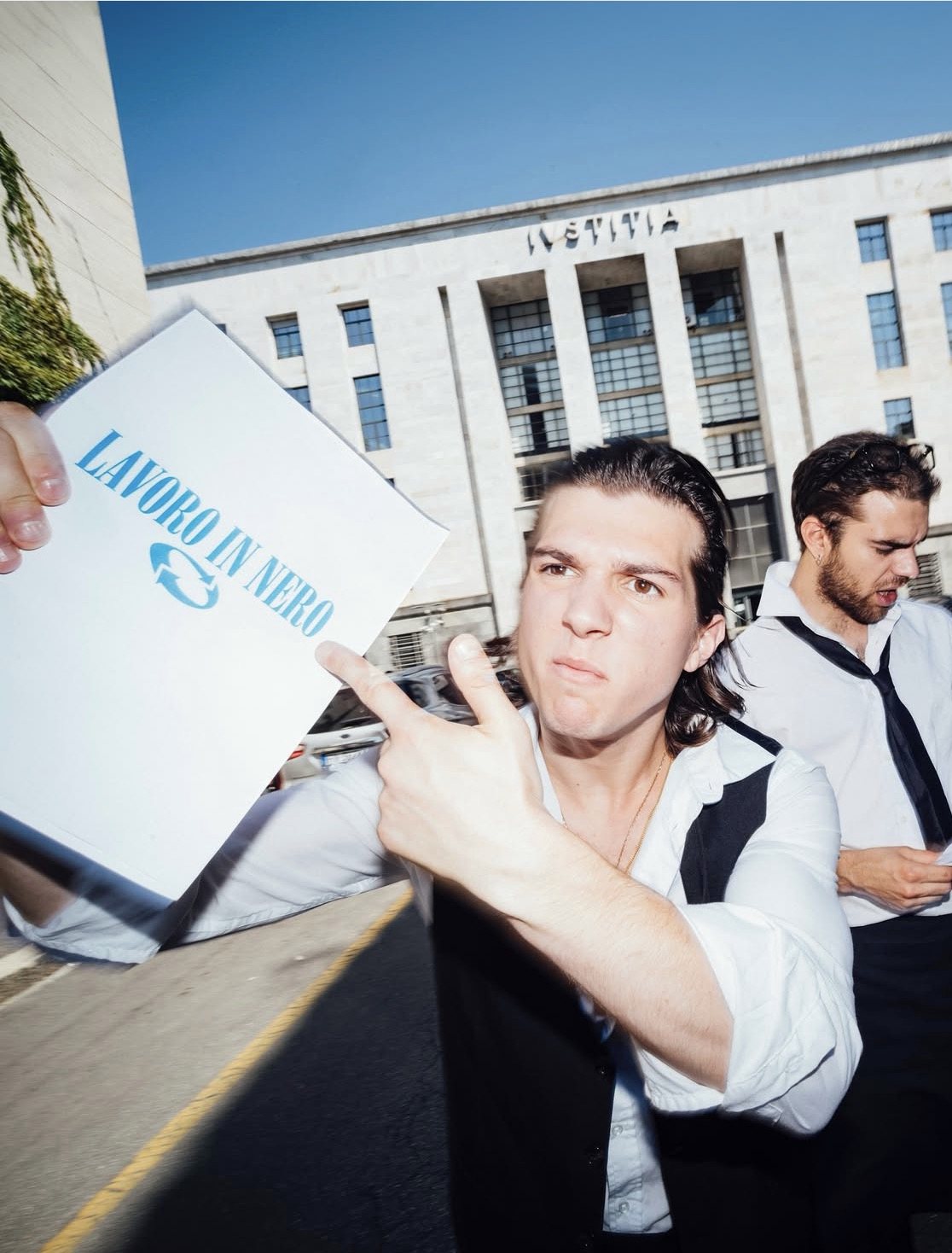 VI holding manifesto style sign